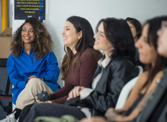 group of people sitting in a training room