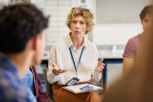 a group of adults in discussion
